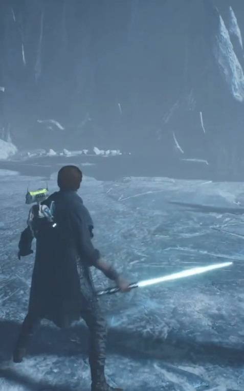 cal kestis using his cyan lightsaber in the video game: Star Wars Jedi: Fallen Order