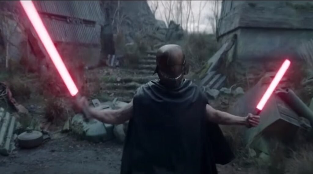 Qimir with is lightsaber as two blades